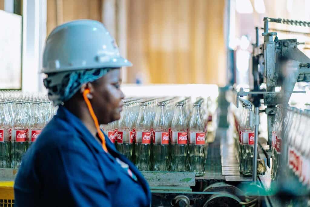 Manufacturing plant manager overseeing production line operations versus warehouse manager roles