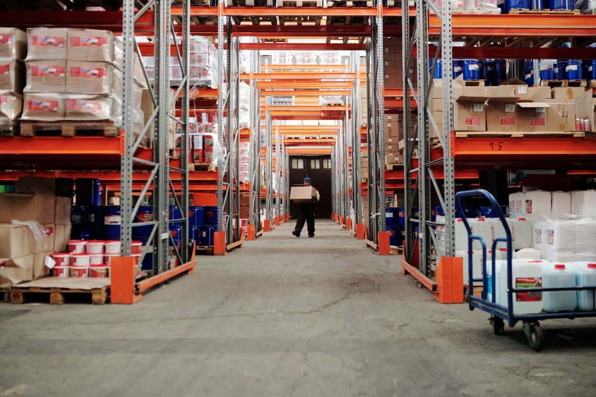 Worker executing warehouse operations tasks defined in a strong job description