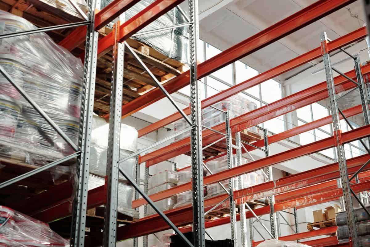Modern warehouse where warehouse management system skills drive pallet storage and order flow